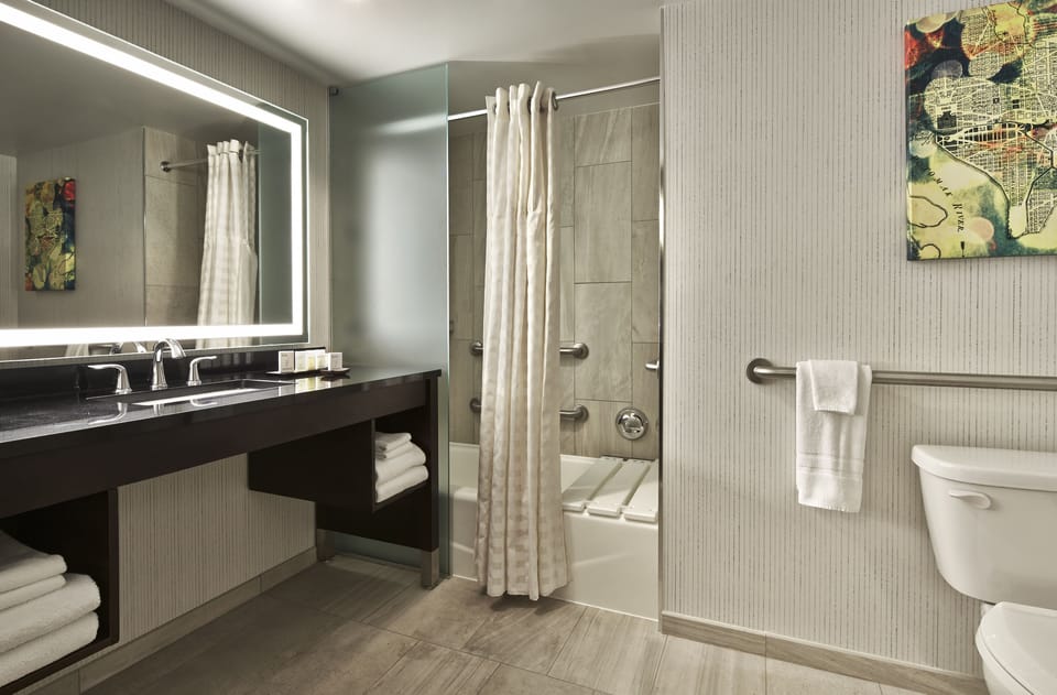 Designer toiletries, hair dryer, towels, soap