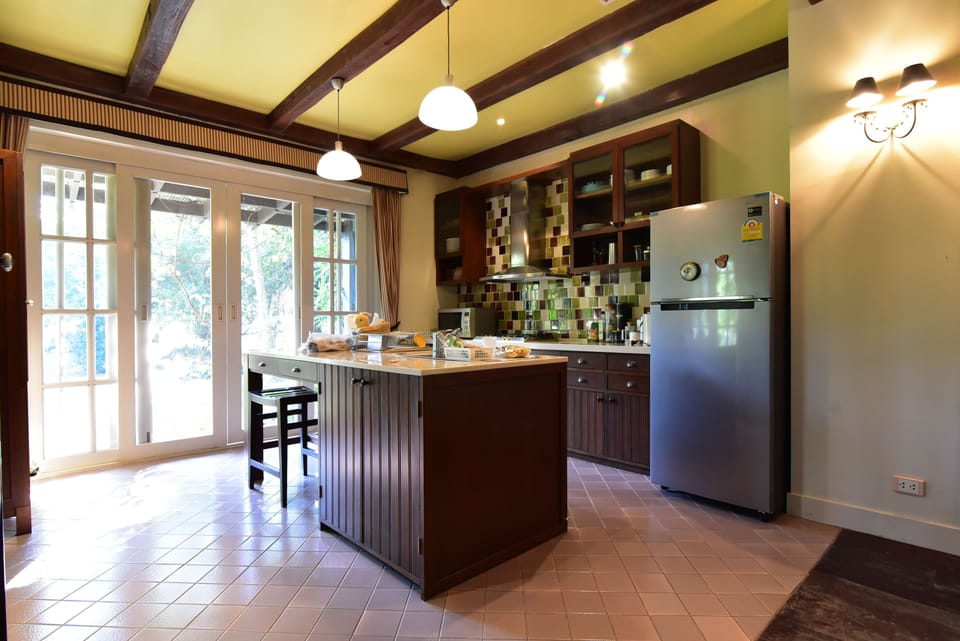 4 Bedrooms Villa | Private kitchen | Full-size fridge, microwave, stovetop, electric kettle