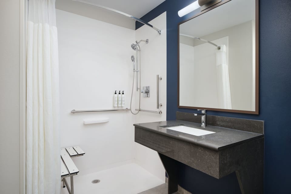 Combined shower/tub, eco-friendly toiletries, hair dryer, towels