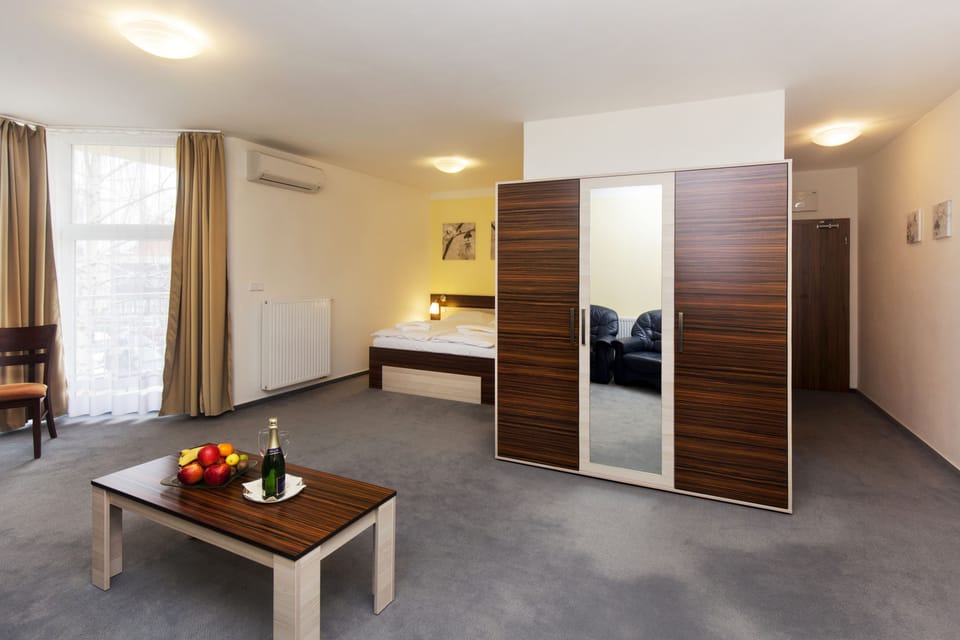 Desk, blackout drapes, soundproofing, iron/ironing board