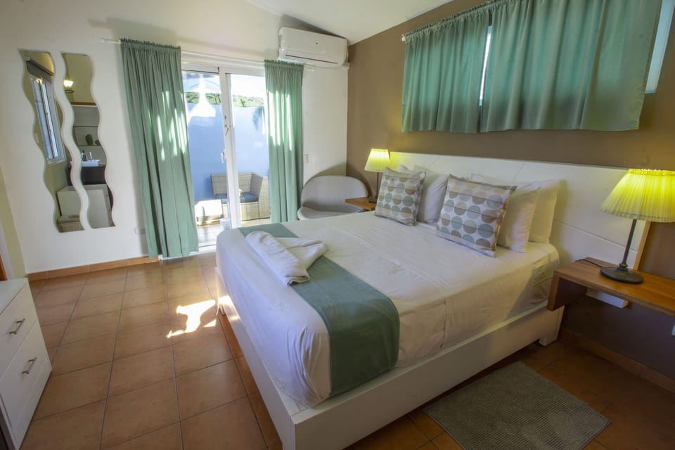 Comfort Double Room, 1 Queen Bed, Balcony, Poolside | Minibar, in-room safe, individually decorated, individually furnished