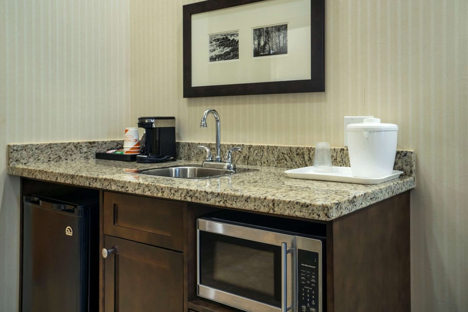 Premium bedding, pillowtop beds, desk, laptop workspace
