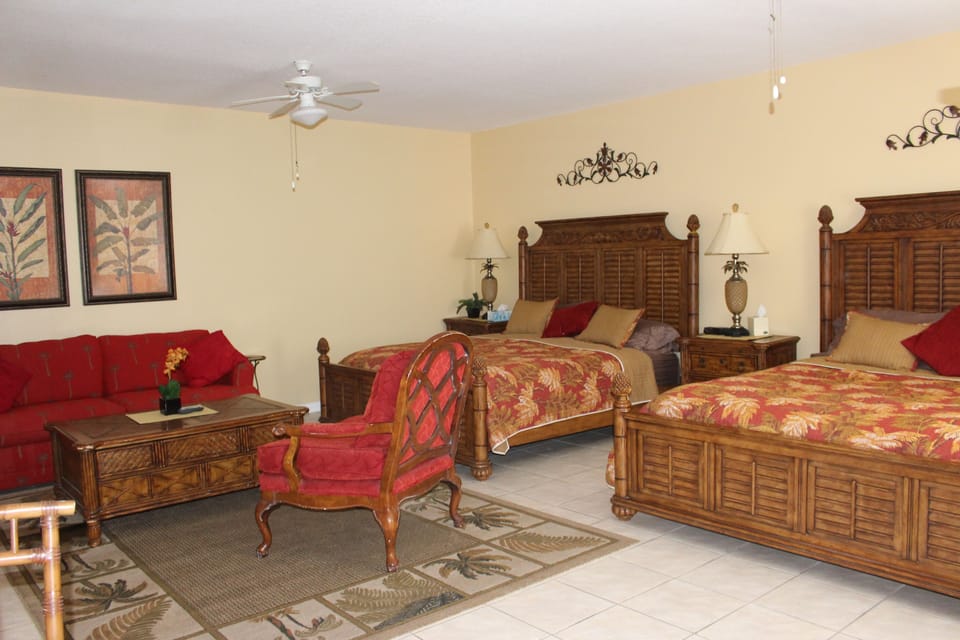 Deluxe Condo, 2 Bedrooms | 1 bedroom, individually decorated, individually furnished, desk