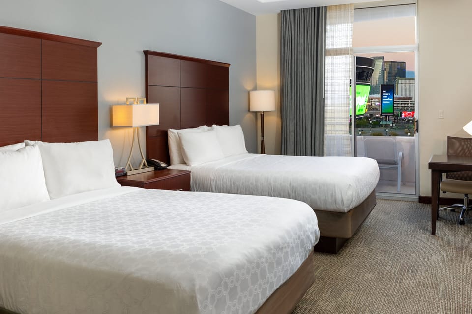 Studio Suite, 2 Queen Beds, Kitchen, City View | Desk, iron/ironing board, free cribs/infant beds, free rollaway beds
