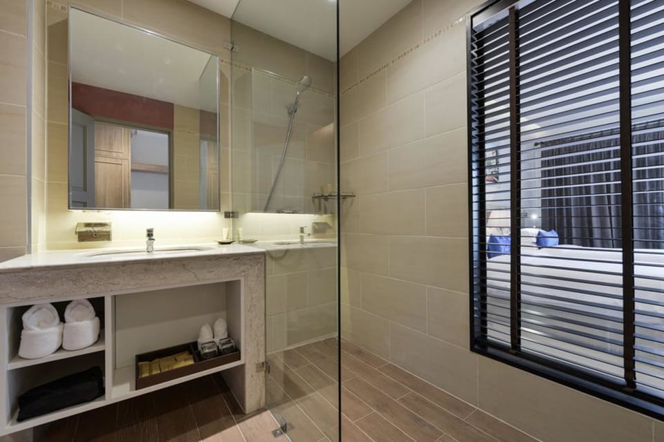 Shower, free toiletries, hair dryer, bathrobes