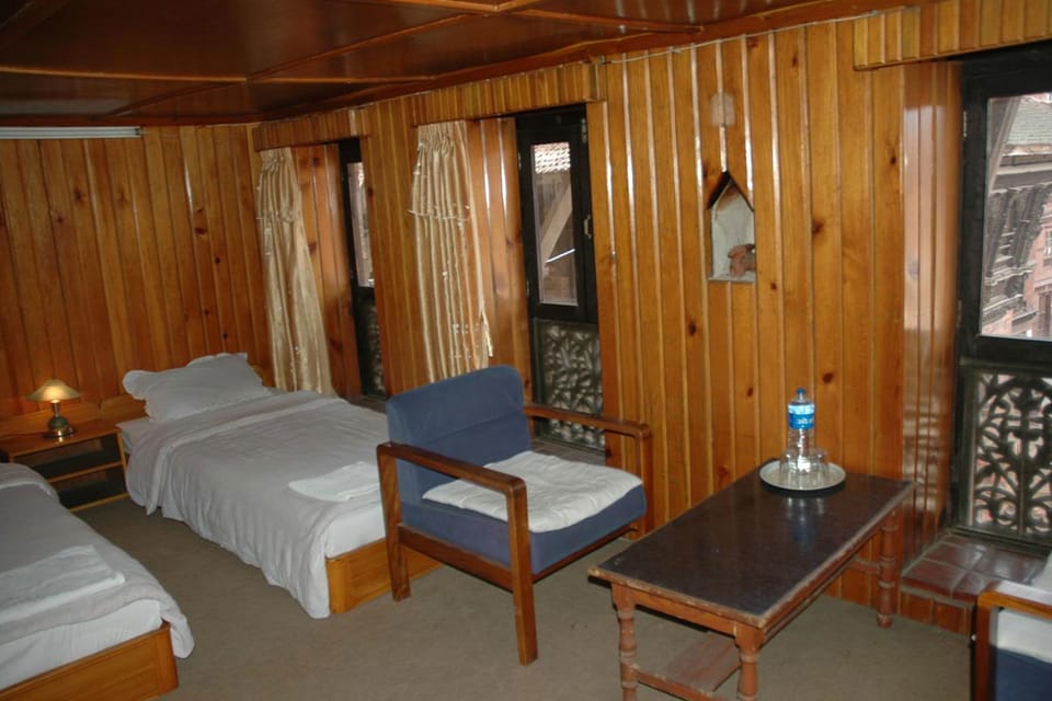 Twin Room, Private Bathroom | In-room safe, iron/ironing board, free WiFi