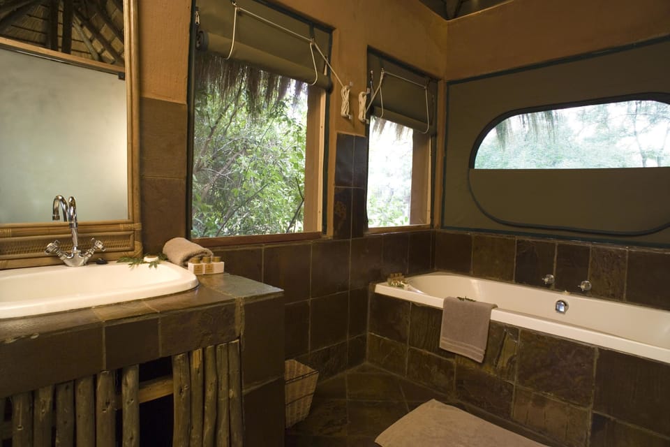 Luxury Tent (Wildside Family) | Bathroom | Separate tub and shower, hair dryer, towels, toilet paper