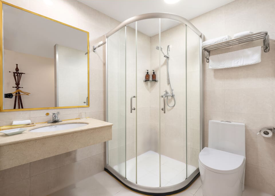 Standard Single Room, No Windows | Bathroom | Combined shower/tub, hair dryer, slippers, towels
