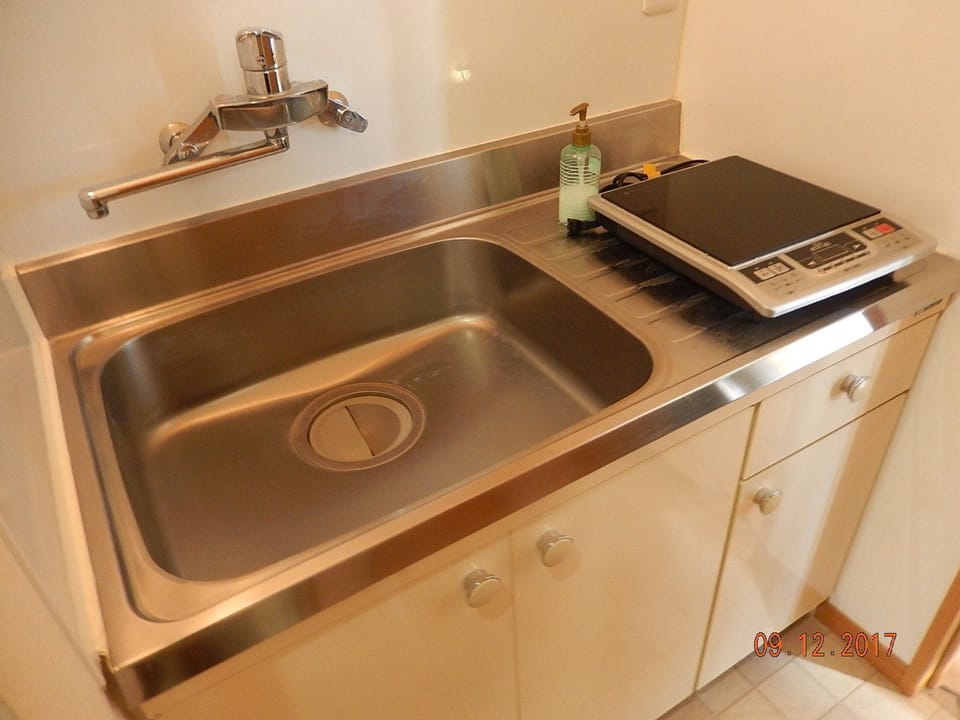 Quadruple Room, Non Smoking | Private kitchenette | Fridge, stovetop