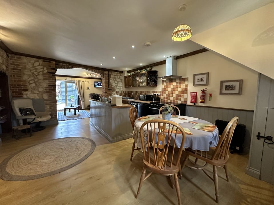 Family Cottage, 2 Bedrooms, Partial Sea View, Beachside | Private kitchen | Fridge, eco-friendly cleaning products