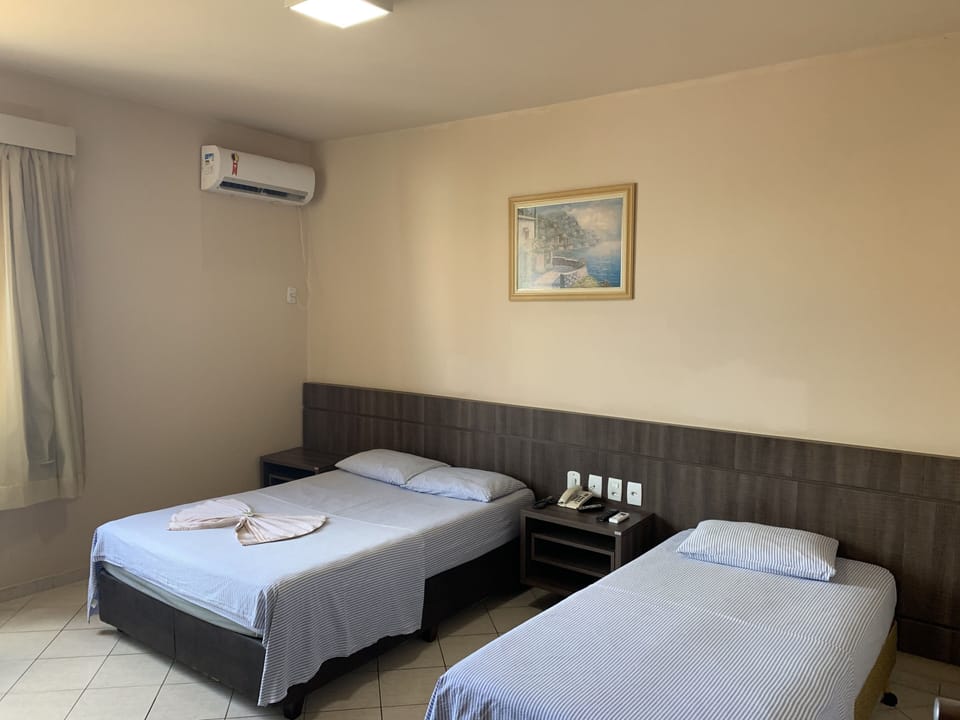 Double Room | Minibar, desk, blackout drapes, iron/ironing board (on request)