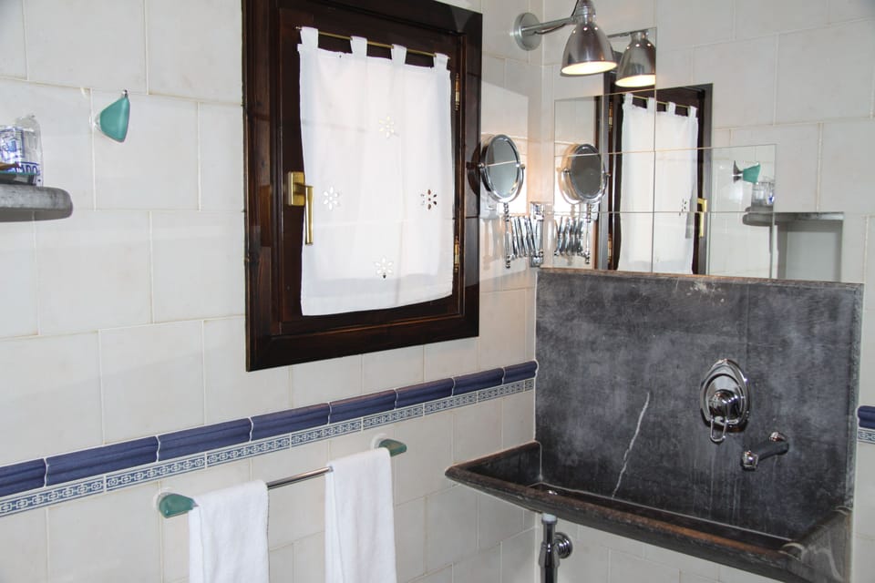 Double or Twin Room, Mountain View | Bathroom | Shower, free toiletries, hair dryer, slippers