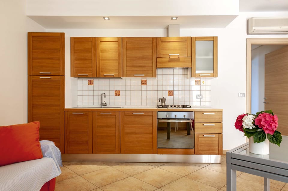 Apartment, 1 Bedroom | Private kitchen | Full-size fridge, stovetop