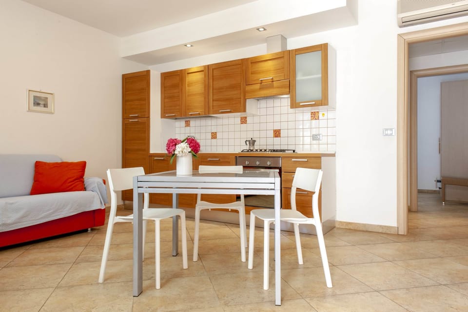 Apartment, 1 Bedroom | Private kitchen | Full-size fridge, stovetop