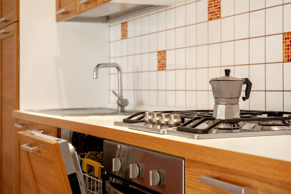 Apartment, 1 Bedroom | Private kitchen | Full-size fridge, stovetop