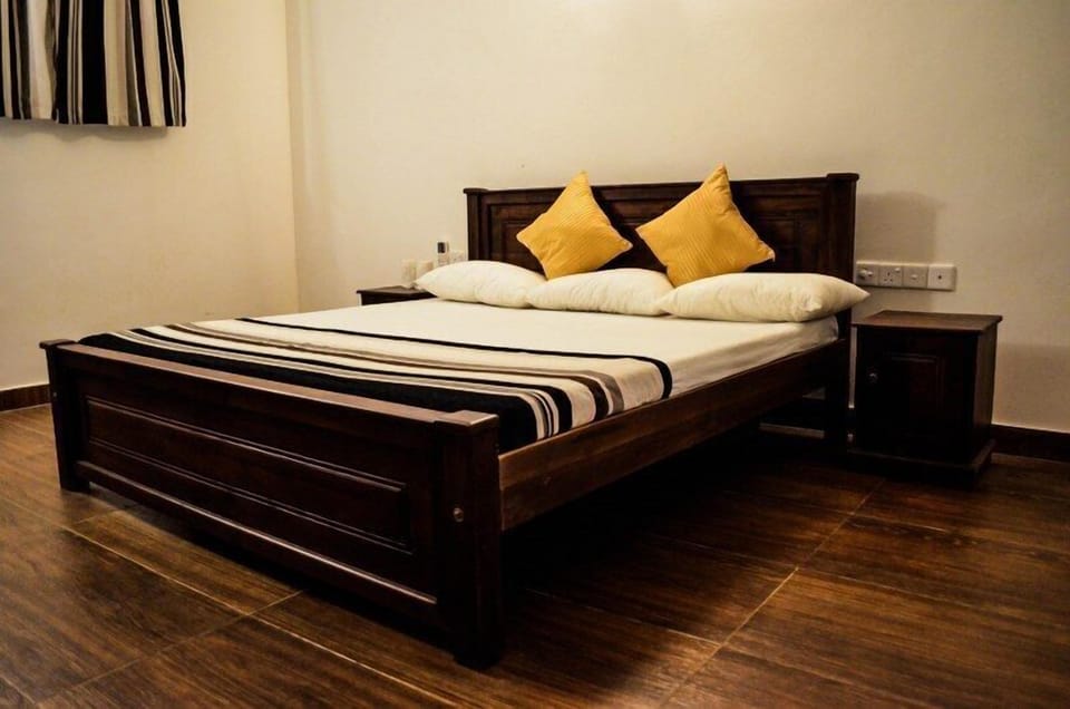 Economy Double Room Single Use, 1 King Bed, River View, Garden Area | 1 bedroom, premium bedding, minibar, iron/ironing board