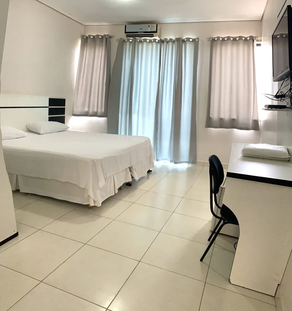 Double Room | Minibar, desk, blackout drapes, iron/ironing board (on request)