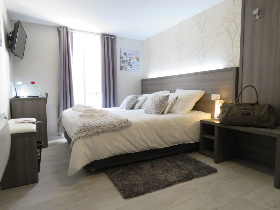 Quadruple Room | Blackout drapes, soundproofing, free WiFi, bed sheets