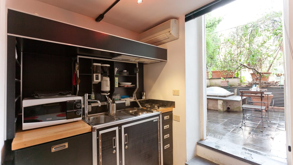 Apartment, 1 Bedroom | Private kitchenette | Fridge, stovetop, coffee/tea maker, cookware/dishes/utensils
