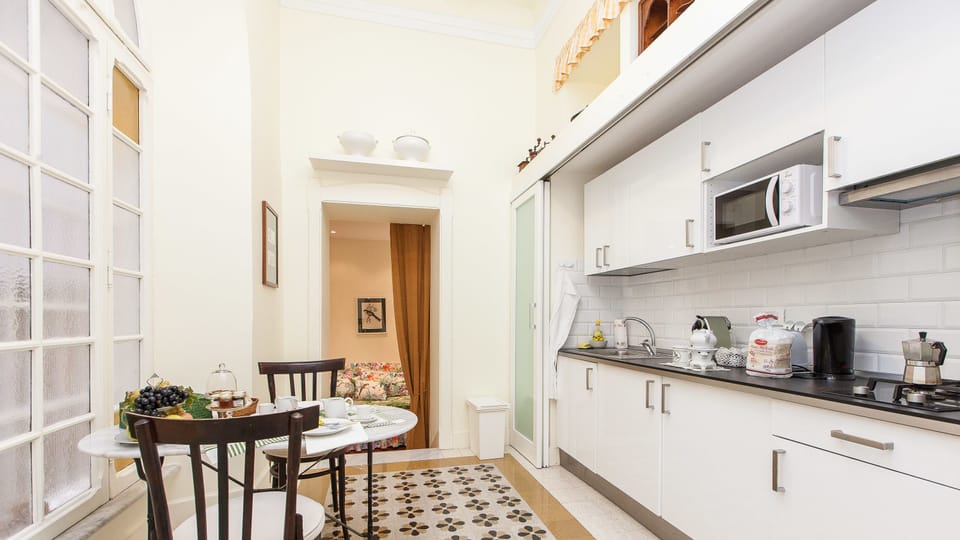 Apartment, 2 Bedrooms | Private kitchen | Full-size fridge, microwave, stovetop, electric kettle