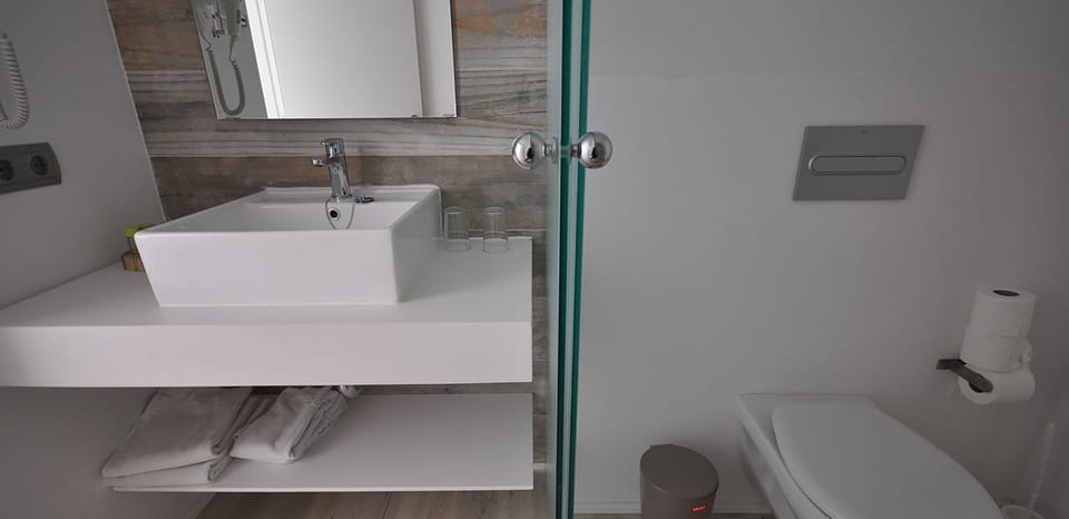 Basic Apartment, 1 Bedroom, Balcony | Bathroom | Free toiletries, hair dryer, towels, soap