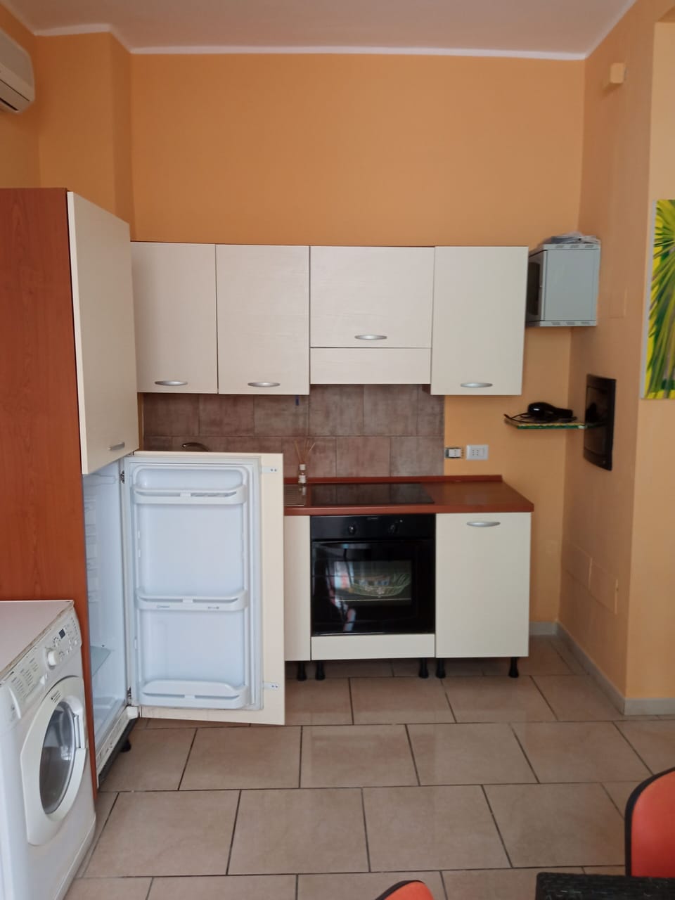 Basic Apartment, Mixed Dorm | Living area | Flat-screen TV