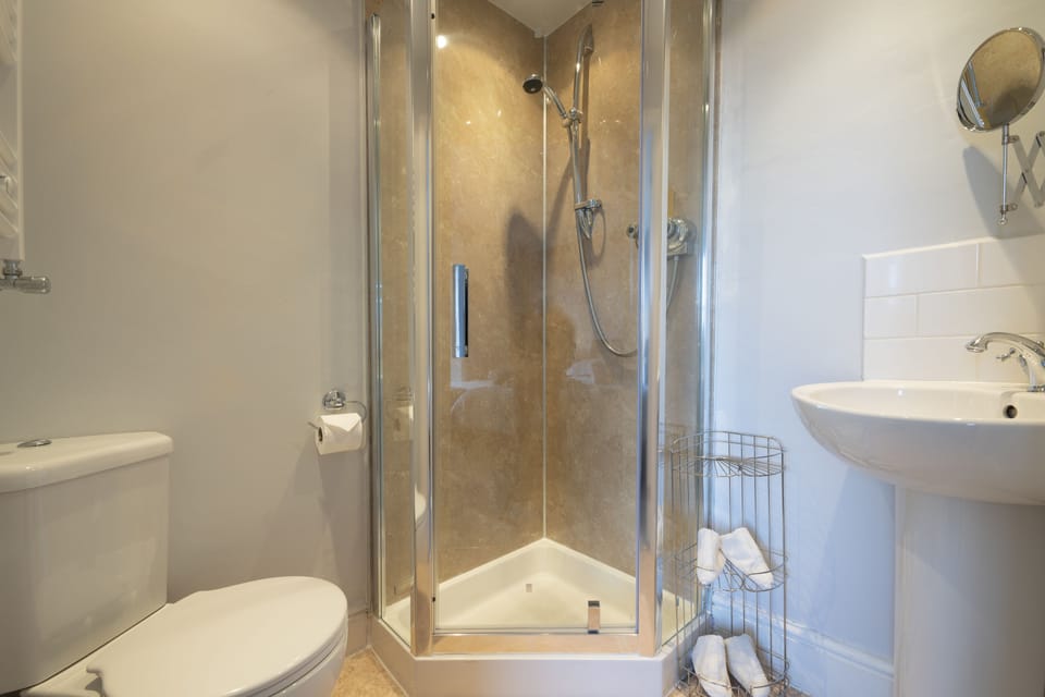 Shower, free toiletries, hair dryer, towels