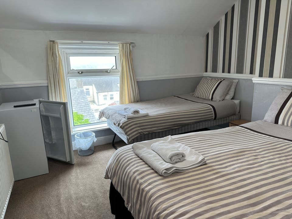 Family Room, Ensuite | Iron/ironing board, travel crib, free WiFi, bed sheets