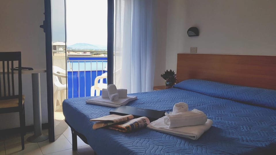 Desk, laptop workspace, free WiFi, bed sheets