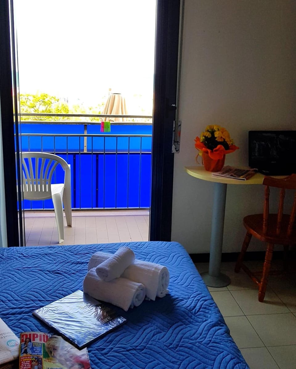 Desk, laptop workspace, free WiFi, bed sheets