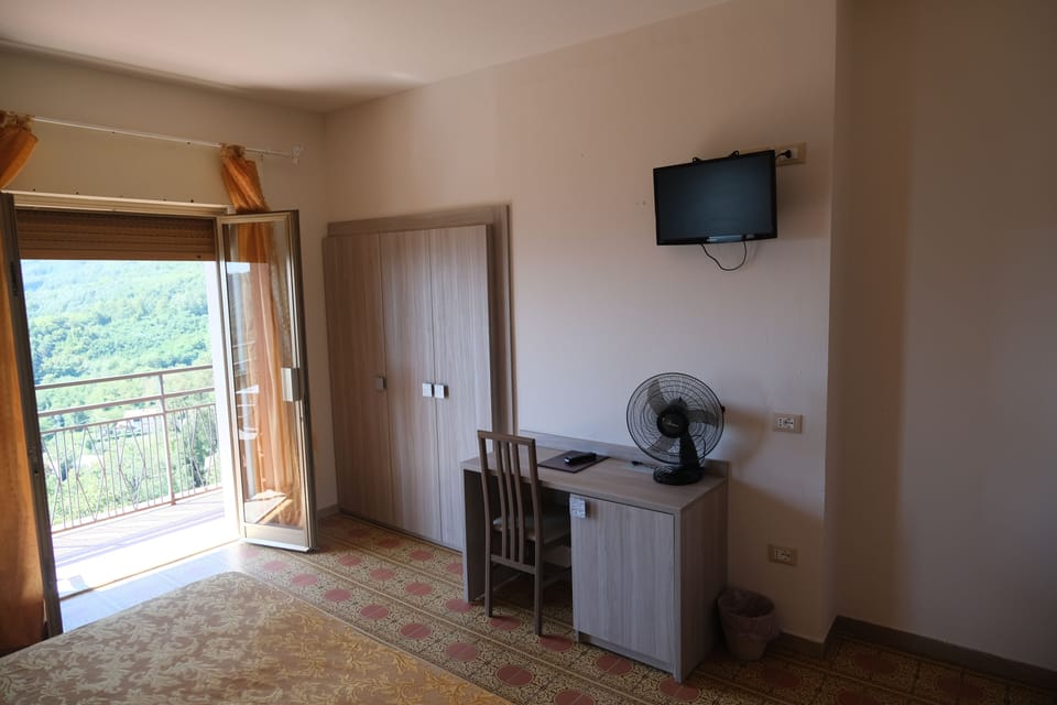 Comfort Quadruple Room, Balcony | In-room safe, desk, cribs (surcharge), WiFi (free)