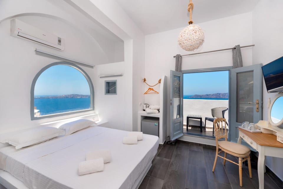 Standard Double Room (Caldera View) | In-room safe, iron/ironing board, free WiFi, bed sheets