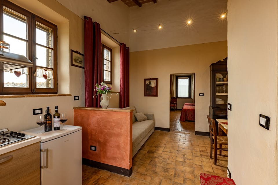 Deluxe Apartment, 1 Bedroom | Private kitchen | Fridge, espresso maker, highchair