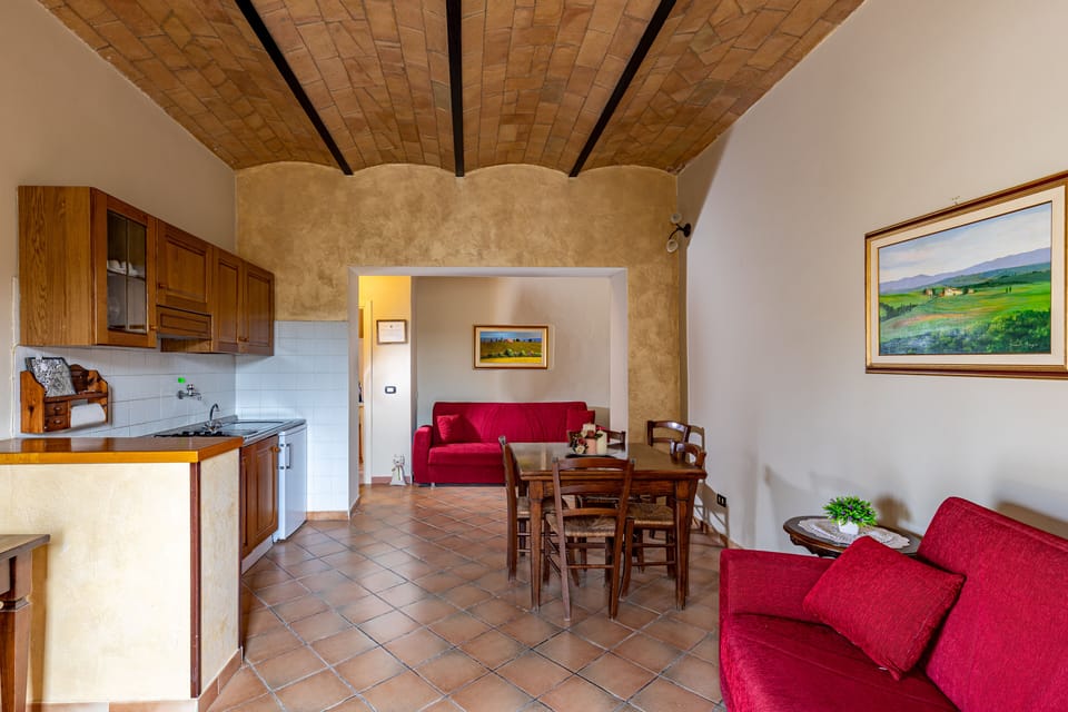 Exclusive Apartment | Living area | 22-inch flat-screen TV with cable channels, TV