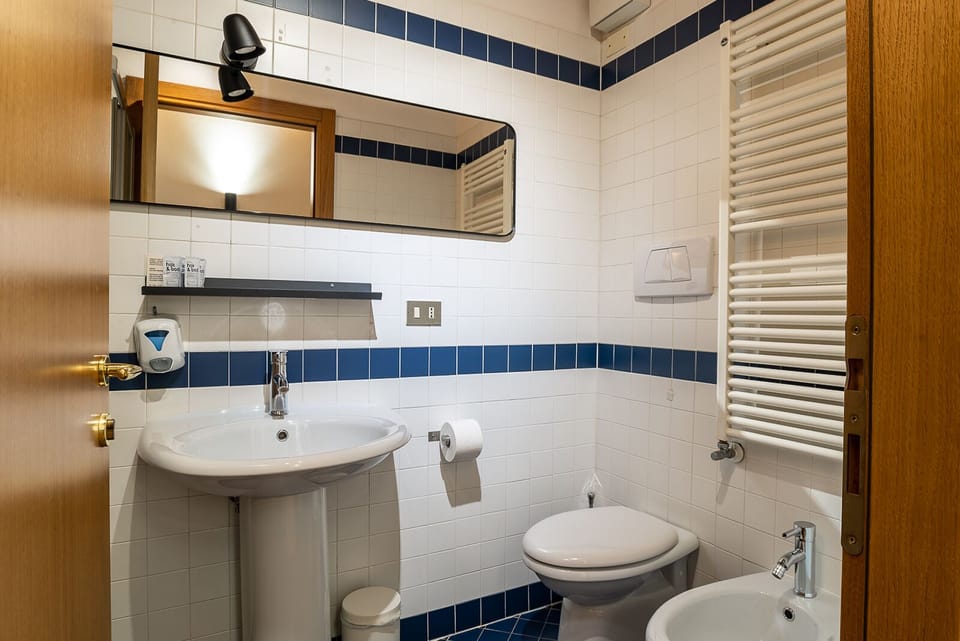 Family Room, 2 Bedrooms | Bathroom | Shower, free toiletries, hair dryer, bidet