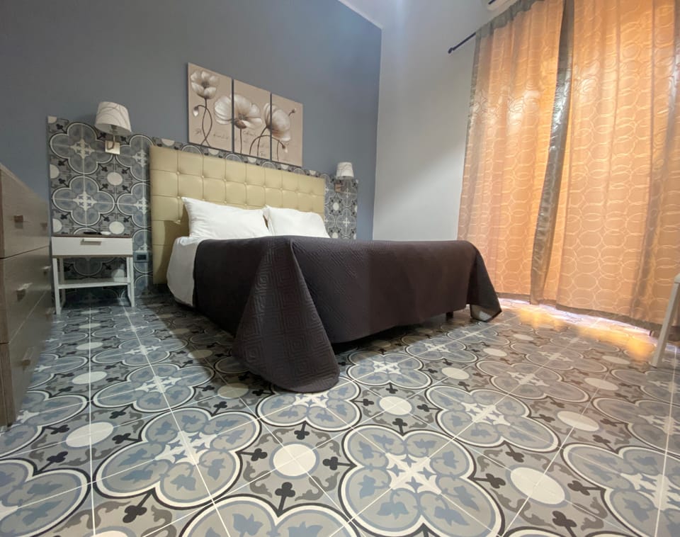 Comfort Triple Room, City View | Minibar, in-room safe, desk, soundproofing