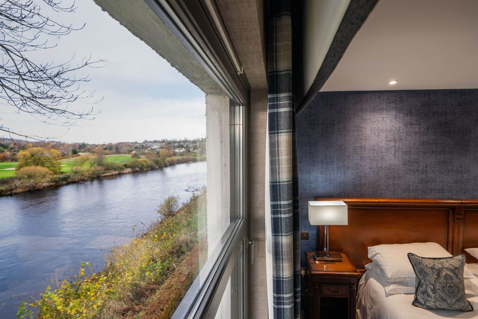Classic Room, River View | Premium bedding, desk, iron/ironing board, travel crib