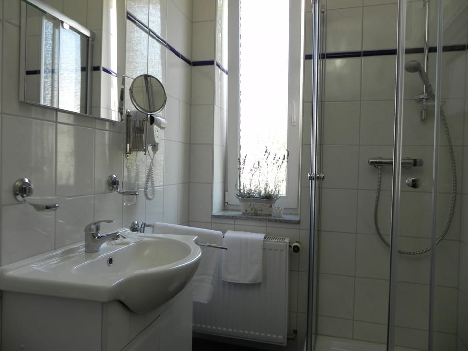 Shower, free toiletries, hair dryer, towels