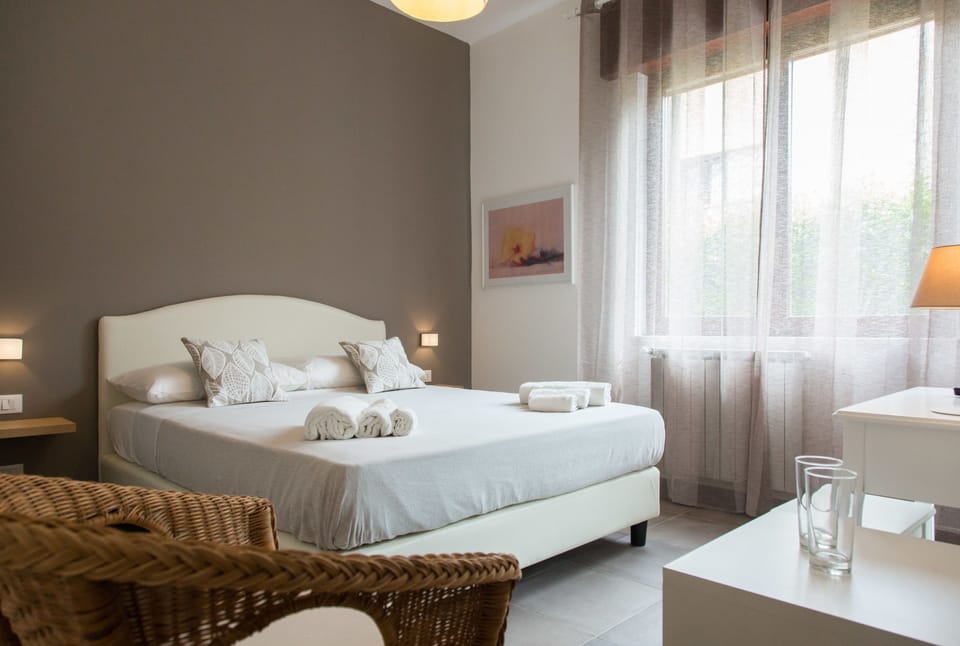 Romantic Double Room, Patio, Ground Floor | Minibar, desk, free WiFi, bed sheets