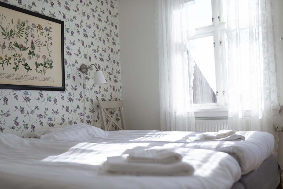 Family Room, 2 Bedrooms, Balcony (Private WC, Shared Shower) | Blackout drapes, iron/ironing board, free cribs/infant beds