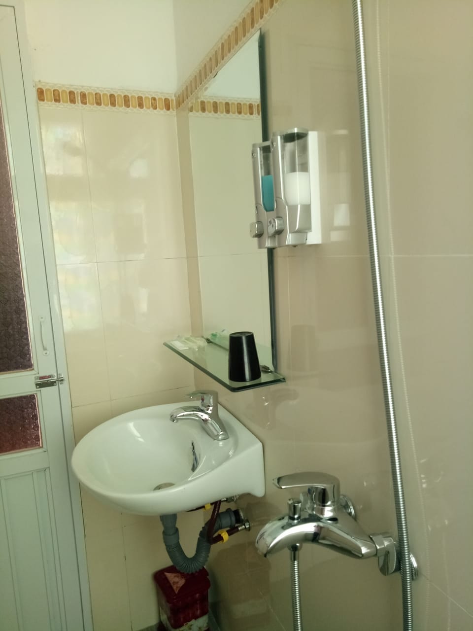 Shower, free toiletries, hair dryer, slippers