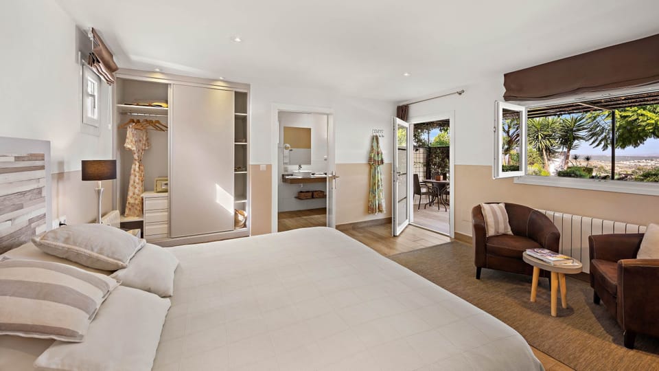 Deluxe Double Room, Lanai, Garden Area | Premium bedding, down comforters, memory foam beds, in-room safe