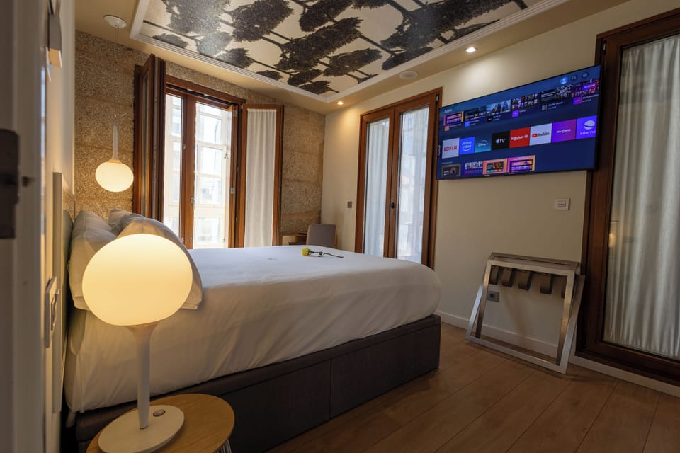 Superior Suite, City View | Minibar, in-room safe, desk, blackout drapes
