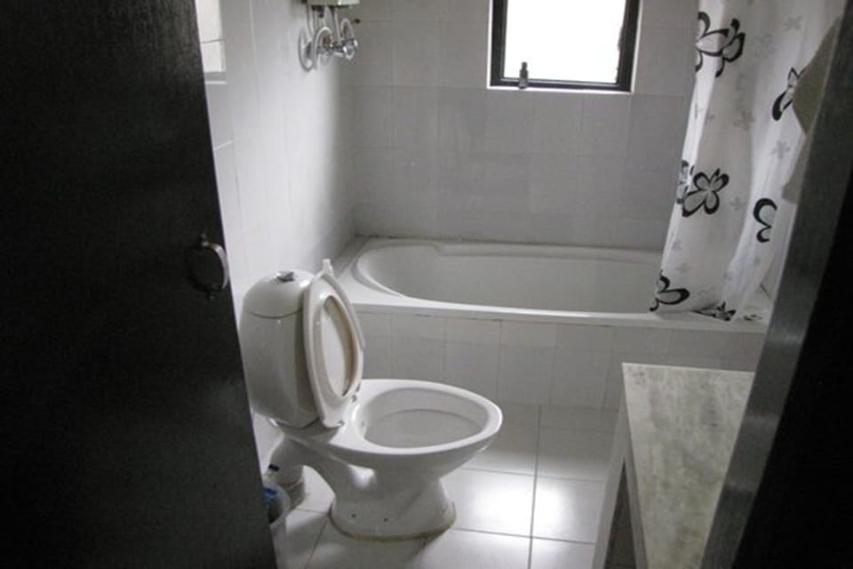 Deluxe Room, Garden View | Bathroom | Shower, bathrobes, slippers, towels