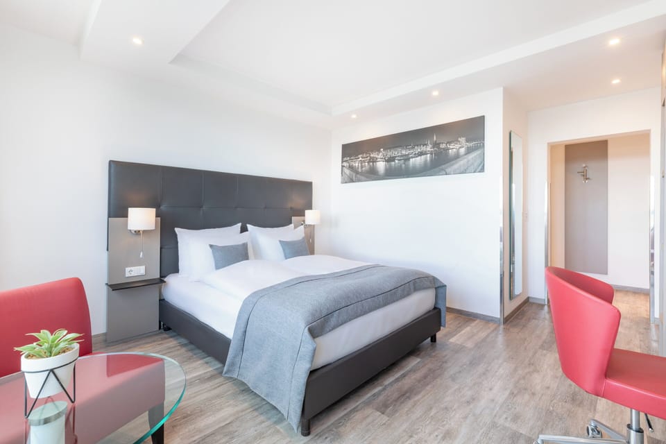 Hypo-allergenic bedding, in-room safe, desk, soundproofing