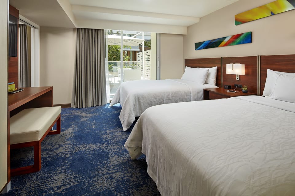 Premium bedding, in-room safe, blackout drapes, soundproofing