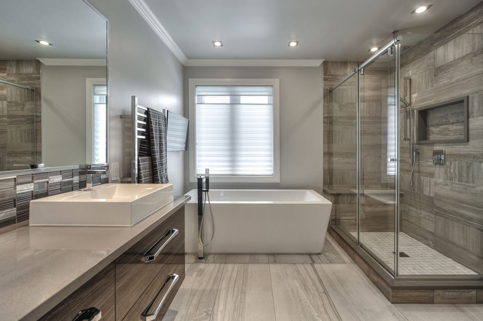 Deep soaking tub, rainfall showerhead, slippers, towels