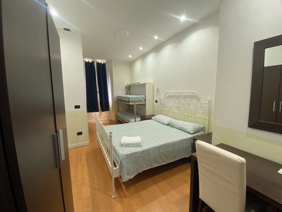 Quadruple Room | Desk, blackout drapes, cribs/infant beds, free WiFi