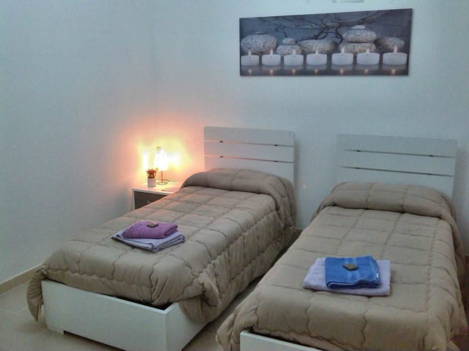 Apartment, 3 Bedrooms | Down comforters, in-room safe, desk, rollaway beds