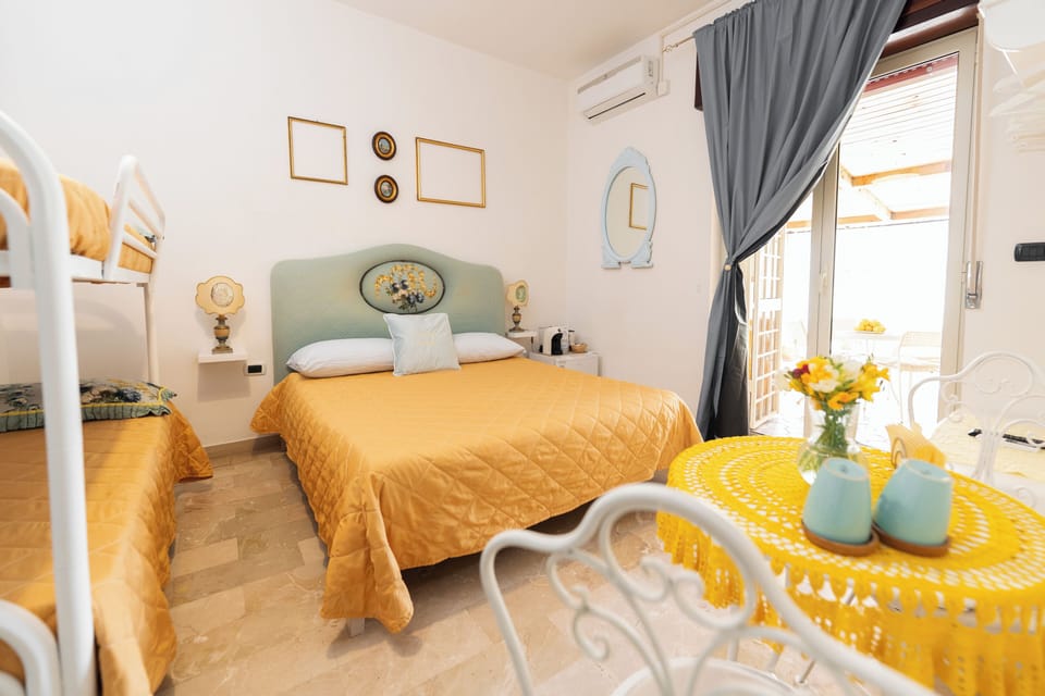 Deluxe Quadruple Room, Terrace | 1 bedroom, minibar, desk, soundproofing